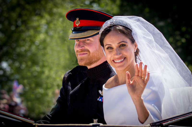 Harry & Meghan in their open carriage